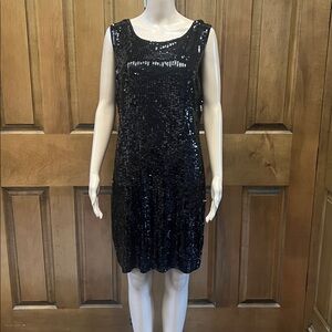 Michael Kors Black Sequin Mini Dress
Pit to Pit 21”
Length 35”
Armhole 11”